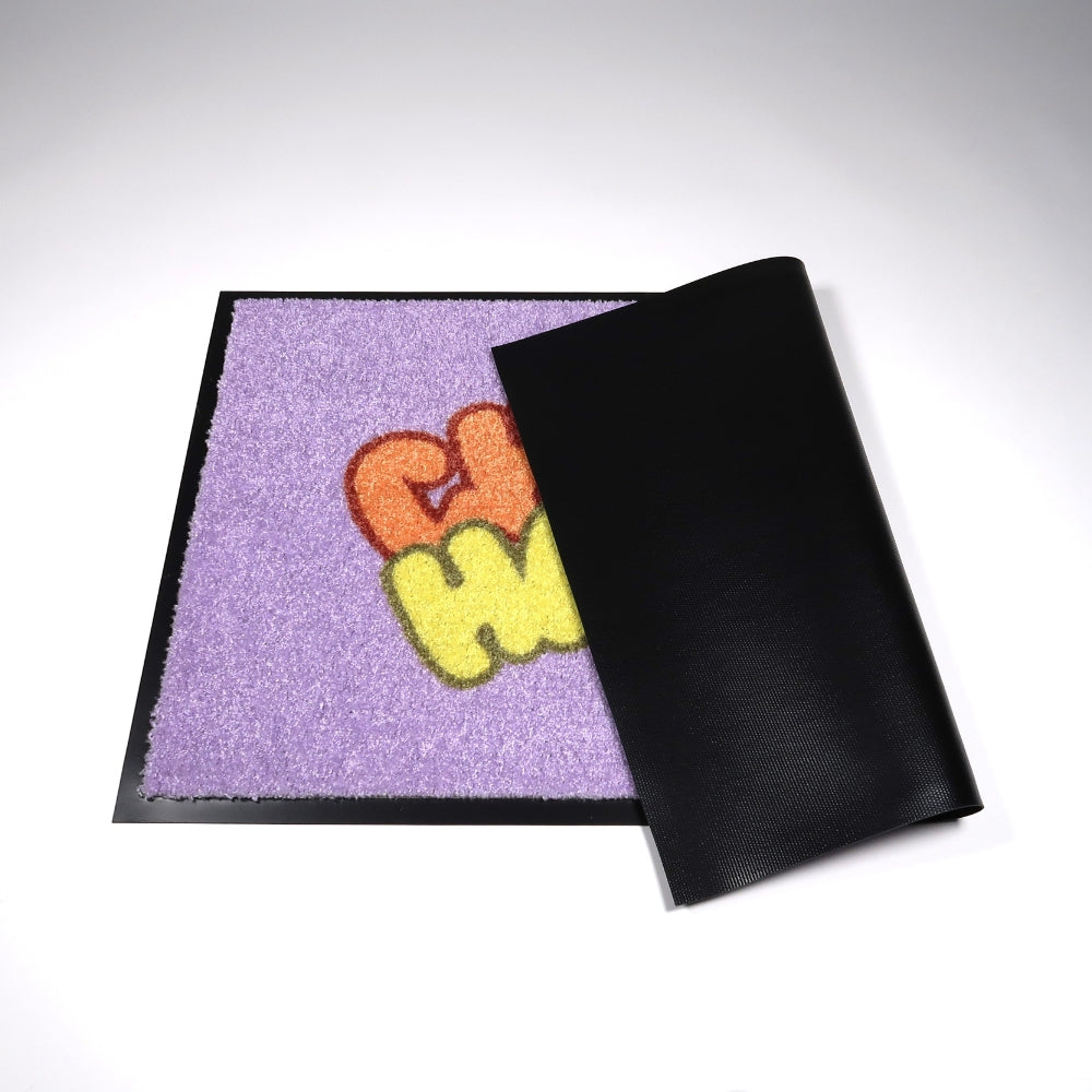 Värikäs kynnysmatto