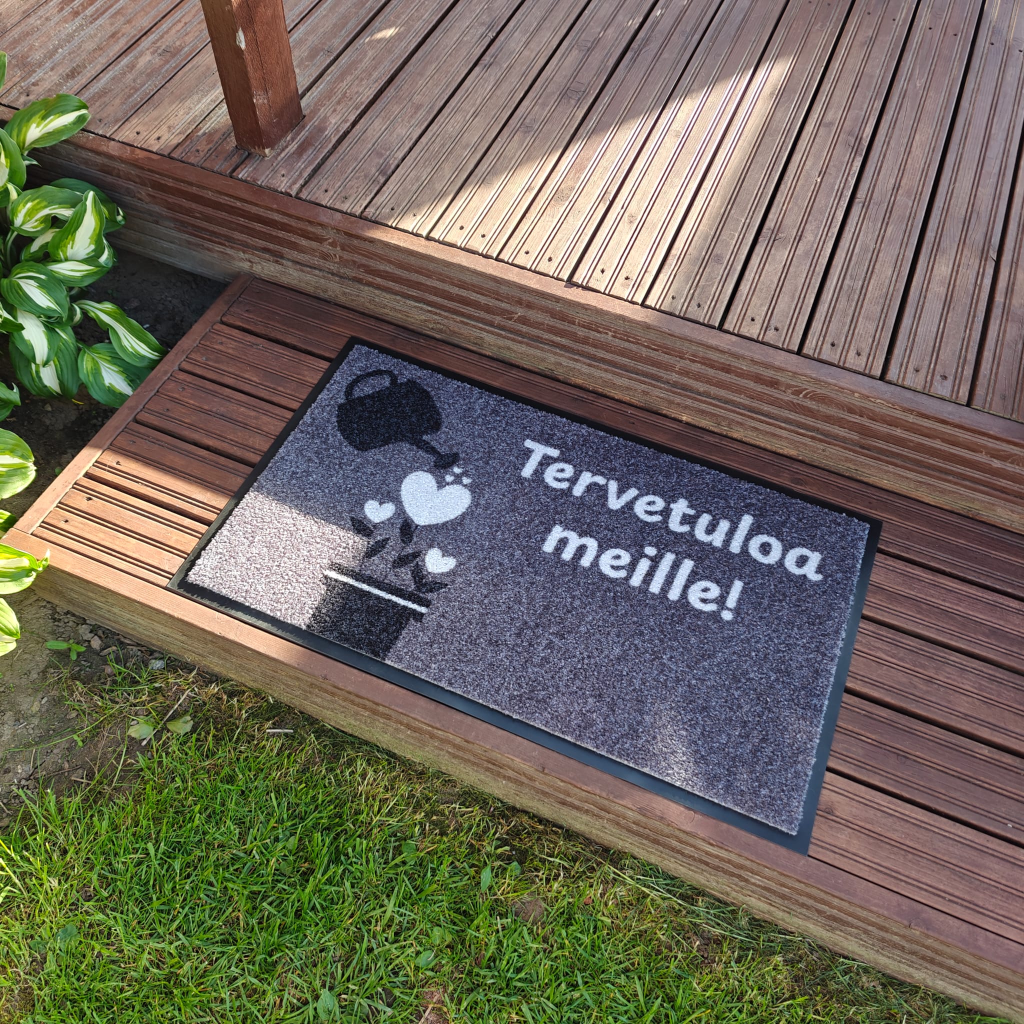 Harmaamatto omalla tekstilla