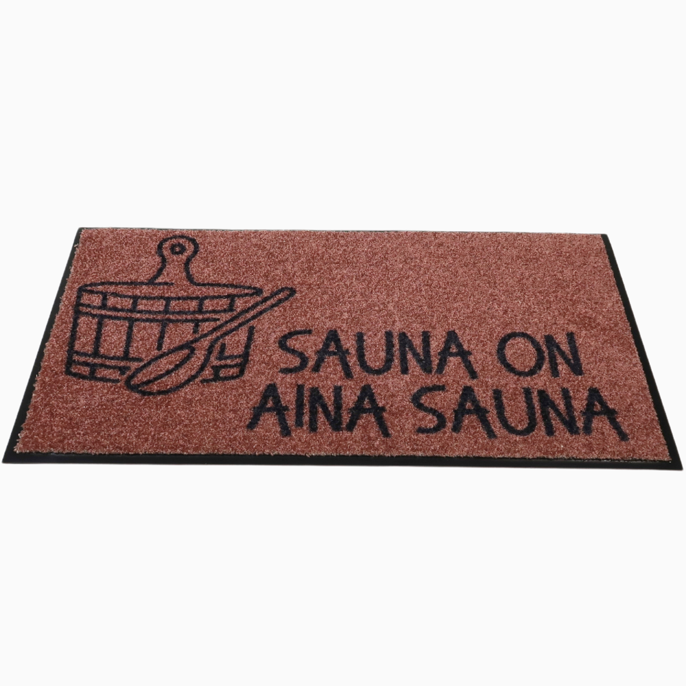 Ruskea saunan matto - "Sauna on aina sauna"