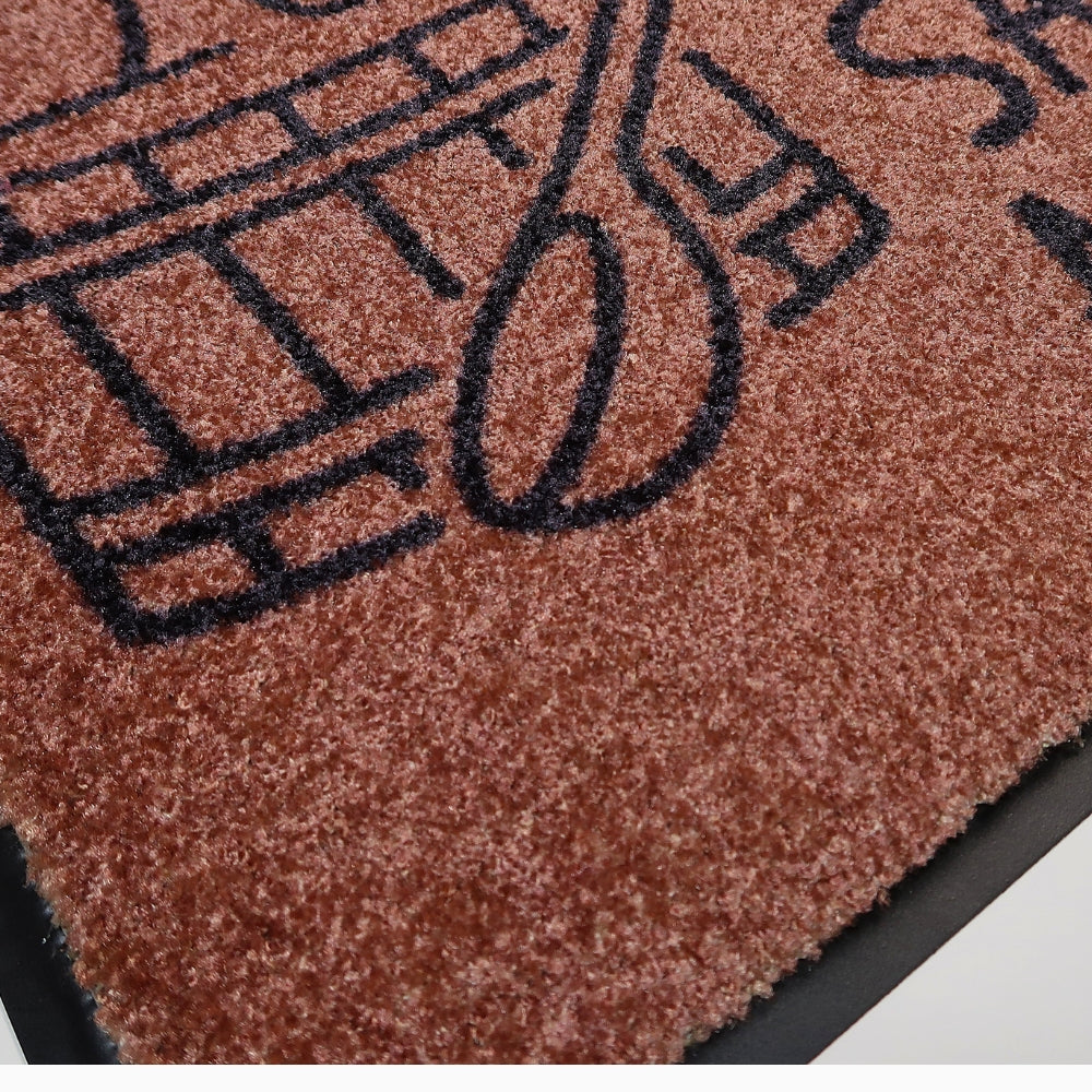 Ruskea saunan matto - "Sauna on aina sauna"