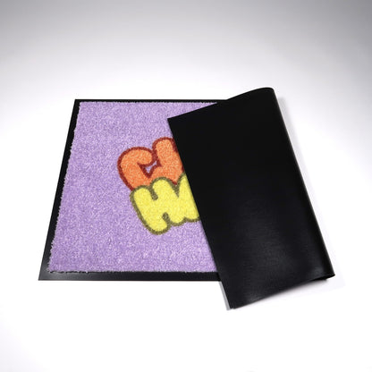 Värikäs kynnysmatto