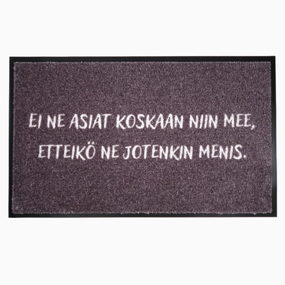 Harmaa kynnysmatto - "Ei ne asiat koskaan niin mee, etteikö ne jotenkin menis" / Outlet