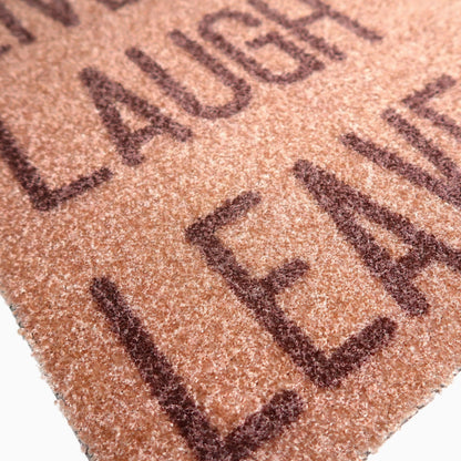 Beige ovimatto - "Live, laugh, leave"